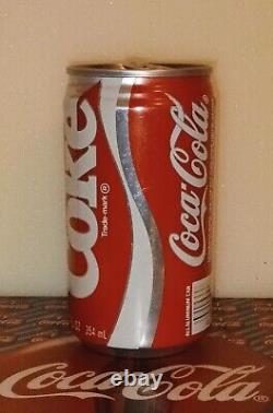 EMPTY NEW COKE collectable rare can from'85 discontinued in 2002